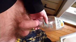 Pissing in Lemonade Bottle